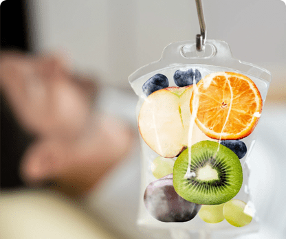 A bag of fruit is hanging on the wall.